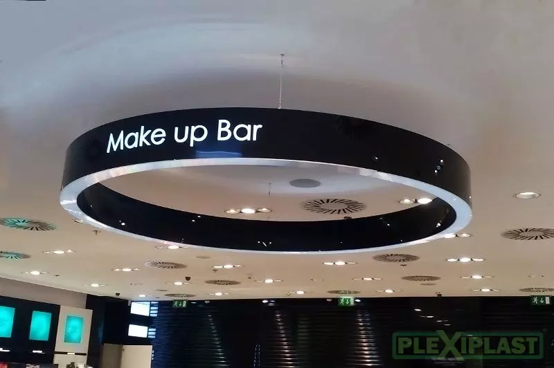 Interior illuminated promotion of a bar